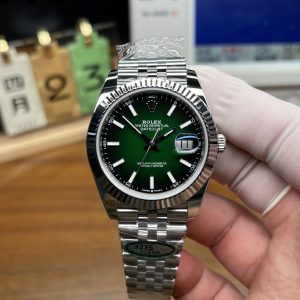 clean Factory 2026 Rolex Datejust m126334 Gradient Green Enamel dial comparison showing true flat gloss finish versus flawed market sunburst dial